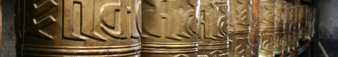 line of buddhist prayer wheels